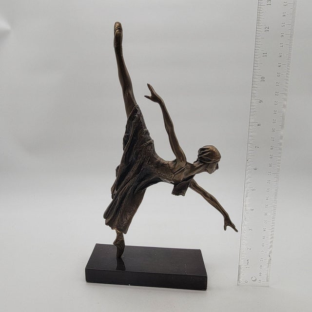 This bronze sculpture of Natalia Makarova captures the elegance of a prima ballerina in an arabesque pose. Limited third...