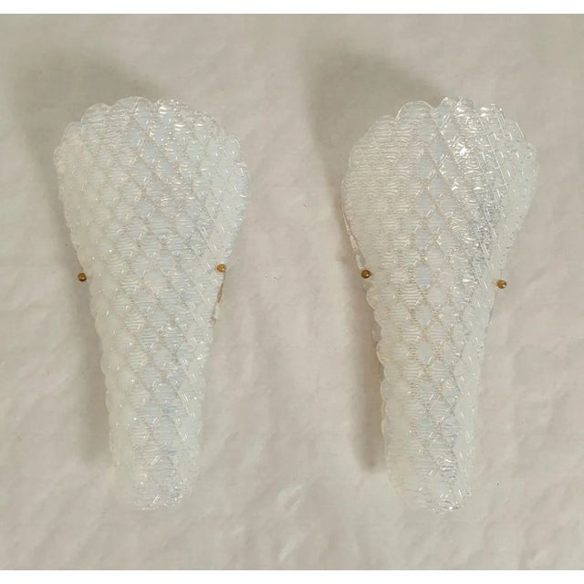 Pair of opaline Murano glass sconces, Mid Century Modern, attributed to Mazzega, Italy 1970s. Set of two pairs, or four...