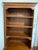 Diverse functionality in the form of two-drawer filing cabinet bottom and 4-shelf bookcase top combined with the cinnamon...
