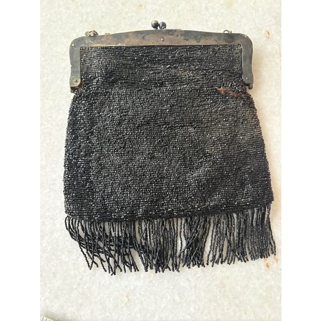 Lovely, antique Art Deco silver plate framed beaded handbag.