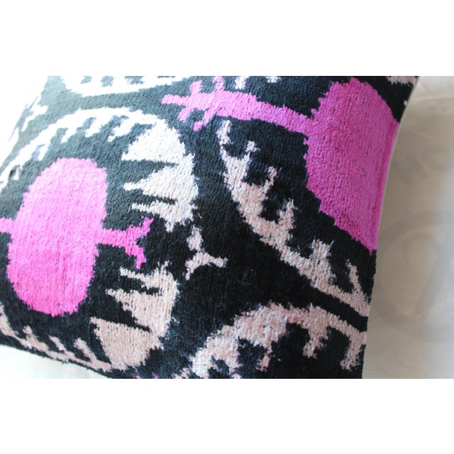 This stylish handmade velvet Ikat pillow cover can accent your sofa, chair, or bedding in a wide variety of interior...