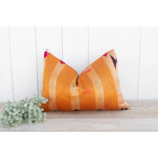 This luxurious Bagh Phulkari pillow features beautiful fine silk embroidery with a diamond pattern on a cotton fabric....