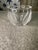 This authentic Lalique France crystal vase features an elegant tulip leaf motif that beautifully blends contrasting clear...