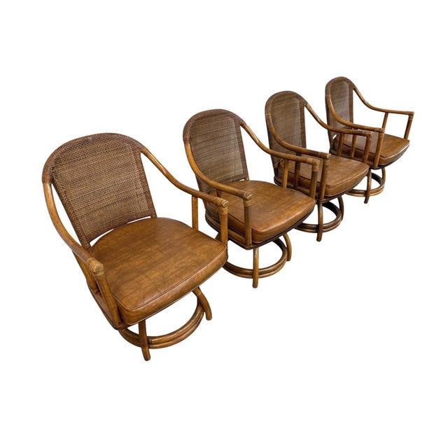 Add a touch of tropical charm to your home with this vintage circa 1970s bamboo and rattan 5-piece dinette set. The set...