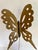 This striking vintage butterfly sculpture features a delicately balanced brutalist design crafted from torch-cut metal and...