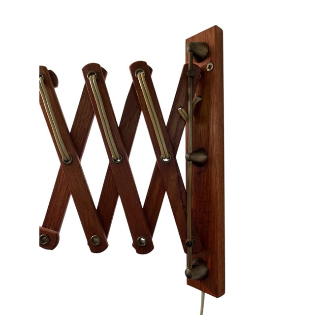 Scissor teak lamp in Mid-century style. This piece has an attribution mark, I am sure that it is completely authentic and...