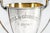 A striking relic of early 20th-century American craftsmanship, this antique sterling silver trophy cup, captures both the...