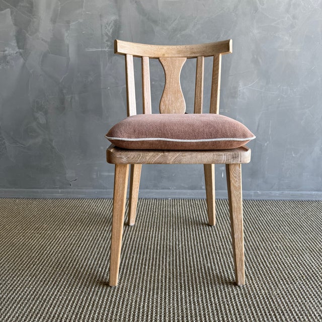 Inspired by the understated elegance of classic Scandinavian design, the Durrell Dining Chair by Bloom Home Inc. is a...