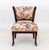 Renaissance Revival Floral Upholstered Low Chair, on carved front paw feet with casters. 30.75" H x 22" W x 23" D; seat:...
