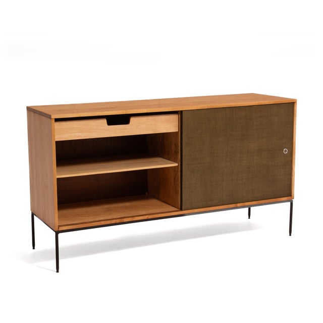 A Mid Century credenza designed by Paul McCobb for the Winchendon Furniture Company Planner Group. This impressive maple...