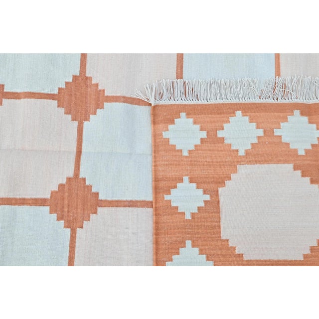 Our exclusive collection of colorfiul, haute bohemian rugs is made from naturally dyed 100% cotton yarn. These dhurrie...