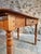 This French table presents an interesting combination of periods, bringing together a late 19th century base with a later...