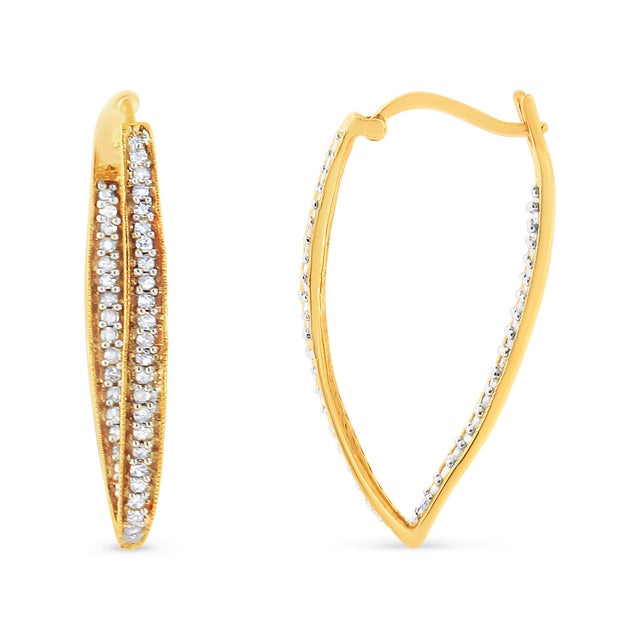 Dress up any outfit with this trendy yet timeless modern hoops. These earrings are crafted in gleaming 10k yellow gold and...