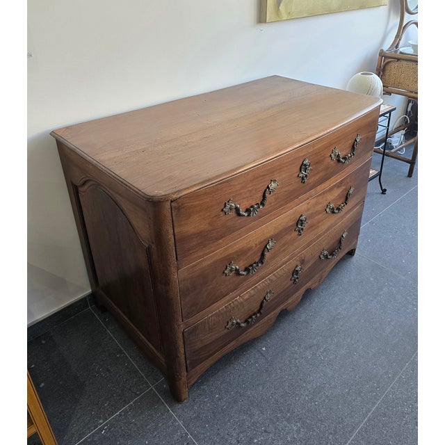 Period: Early 18th century (c. 1700–1730) Style: Late Louis XIV / Regency Origin: French provincial work Material: Solid...