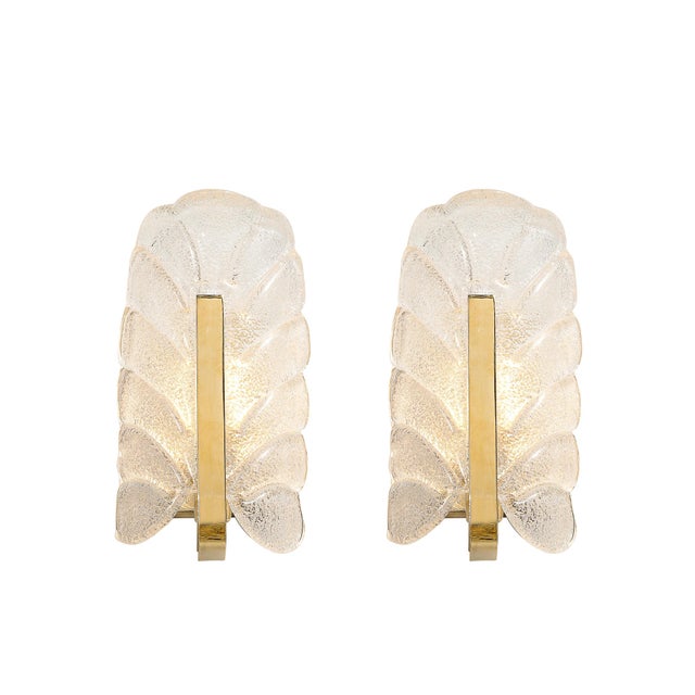 Designed by renowned Swedish designer Carl Fagerlund for Orrefors around 1960, this pair of mid-century modernist sconces...