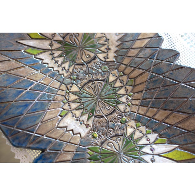 Ali di Libertà (Freedom Wings) is a contemporary Raku ceramic wall sculpture from Stefania Zoppellaro's artistic research....