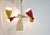 Striking and original mid-century chandelier with 6 coloured articulated lamp shades. The chandelier can be set in...