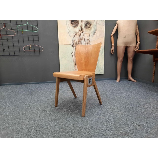 Chair from the 1950s by Kaderer of Munich. Suitable for hall seating, events, dining rooms, restaurants, etc. The chair...