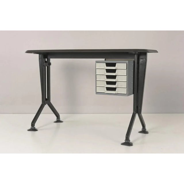 Typewriter desk arco designer: studio bbpr year: 1963 manufacturer: olivetti country: italy measurements: h 68 cm w 112 cm...