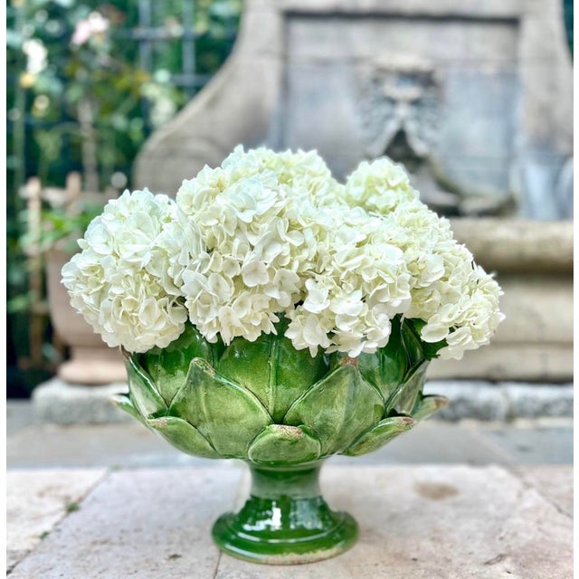 This emerald green artichoke pedestal bowl was hand-thrown and painted in Tuscany, Italy by a heritage studio known for...