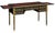 An elegant French writing desk or table of ebonized wood with gilt accents in the Louis XVI style. Featuring a moulded,...