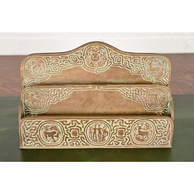 A gorgeous antique Arts & Crafts or Art Deco period gilt bronze "Zodiac" pattern desk letter holder rack By Tiffany...