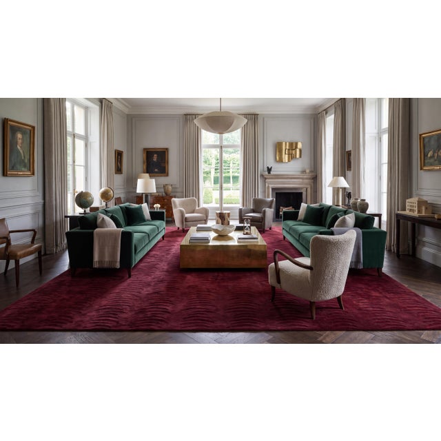 Crafted from a blend of soft Tibetan wool and luminous silk, this modern area rug features a subtle, textural pattern of...
