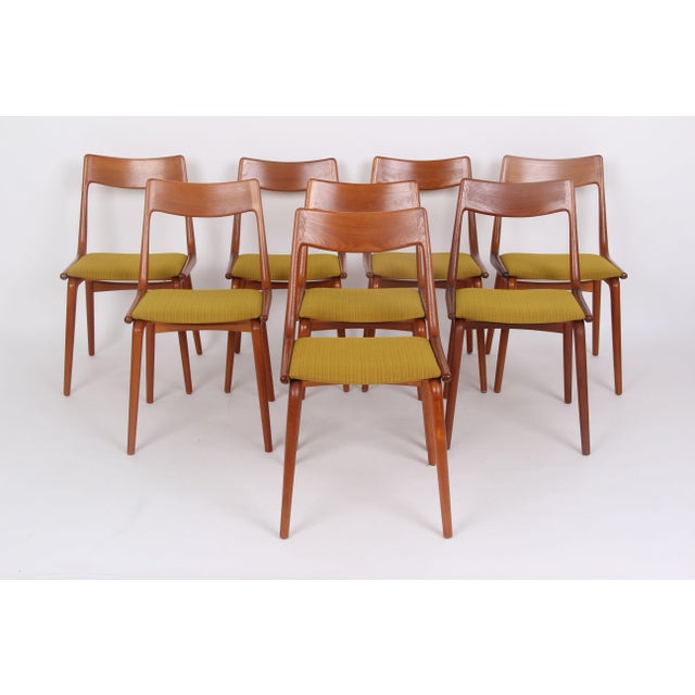 Eight retro Boomerang chairs, designed by Alfred Christensen and manufactured by Slagelse Møbelværk. These are made of...