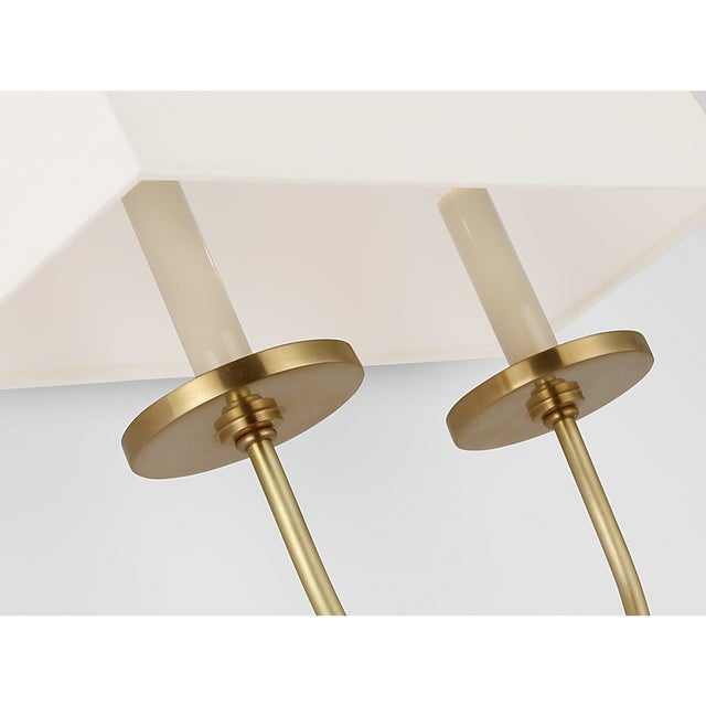 Symmetric Twist Double Sconce in Antique-Burnished Brass with Linen Shade Designer: Chapman & Myers Finish: Antique-...