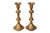 A pair of traditional candlestick holders made of brass. Turned with beehive shaped columns above square bases. Dimensions...