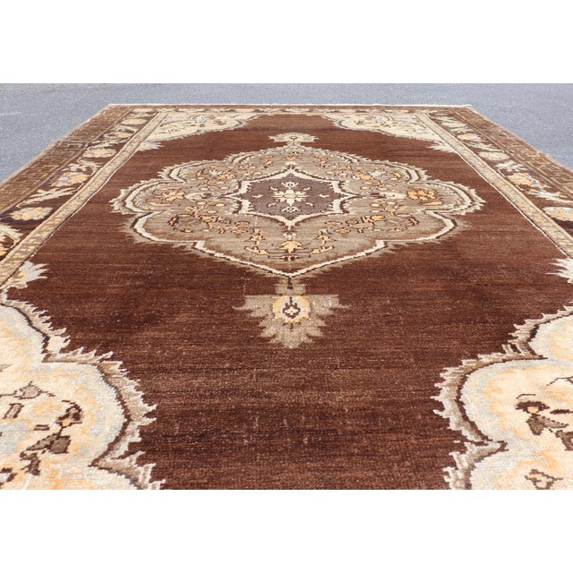Mid 20th Century Brown Background Floral Medallion Vintage Turkish Kars Rug in Ivory and Taupe For Sale - Image 12 of 14