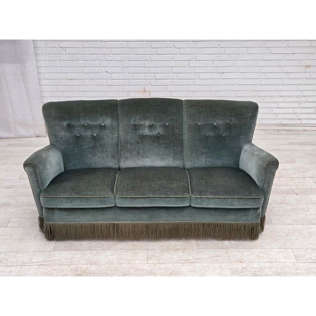 1960s, 3-seater Danish sofa. Green furniture velour, oak wood legs, brass springs in the seat. Original good condition: no...