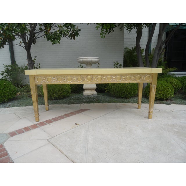 A fabulous giltwood neoclassicla consoel from luxury furniture maker Sylvan San Francisco. The base is white washed...