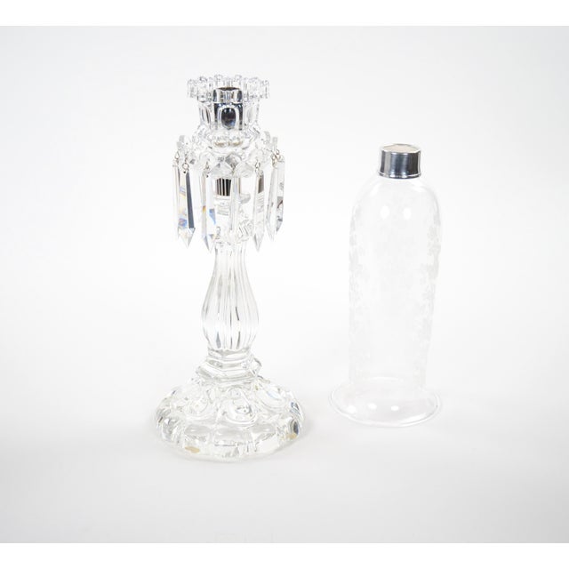 This exceptional antique Saint-Louis crystal candlestick showcases the renowned French crystal house’s mastery in cut and...