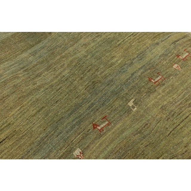 Modern Hand-Knotted Gabbeh Wool Rug – Earth Tones With Minimalist Animal Motifs For Sale In New York - Image 6 of 8