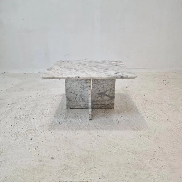 Very nice Italian coffee table, fabricated in the 1980s. It is handcrafted out of very beautiful Carrara marble. The...