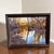 Up for sale is a beautiful, original oil painting depicting a tranquil river scene at what appears to be "golden hour."...
