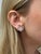 These sparkly starburst earrings contain 20 marquise and 100 round brilliant cut diamonds weighing approximately 1.35...