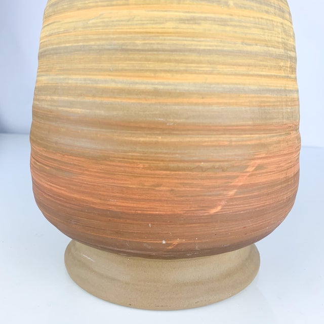 Large vintage Haeger vase with matte sandstone finish. The colors - like a sunset. Love the brown yellow and rust fade....
