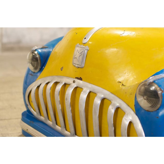 Exceptional four-seat children's merry-go-round. Original painting on sheet metal. This four-seater merry-go-round for...