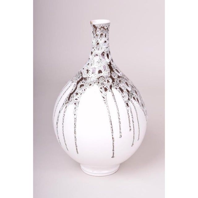 Maker: Ditmar-Urbach This elegant ceramic vase is a work of the renowned Czechoslovakian factory Ditmar-Urbach and dates...