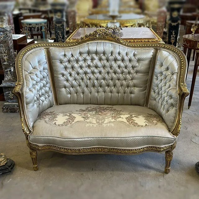 Stunning details. The sofa comes with 2 pillows. Beautiful sofa with gold details. Fully refinished in new gold and...