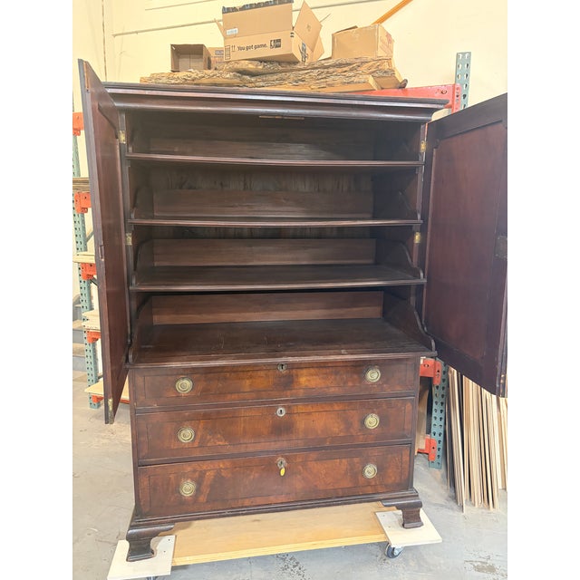 Early 19th Century English Regency Flame Mahogany Linen Press / Clothes Press (c. 1820) Exceptional antique English...
