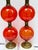 If your're a lover of vintage lighting - you'll love these. Handblown glass spheres in a vibrant orange color with brass...