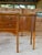 A beautifully handcrafted rattan sideboard by E. Murio of Manila, dating to the late 20th century and newly refinished to...