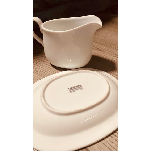 This is a vintage ceramic gravy boat with matching drip plate made by Corning of Japan in the 1980’s from their popular...