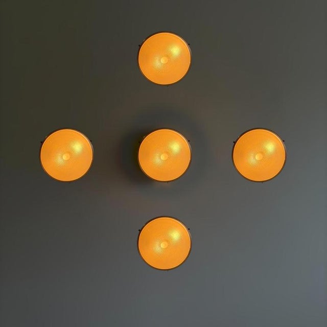 An exceptional and increasingly rare set of five "Sigma" ceiling or wall lights designed by Sergio Mazza for Artemide in...