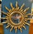 Vintage Italian cared and gilt-wood sunburst mirror. Italian sunburst mirrors are iconic decorative pieces, blending...