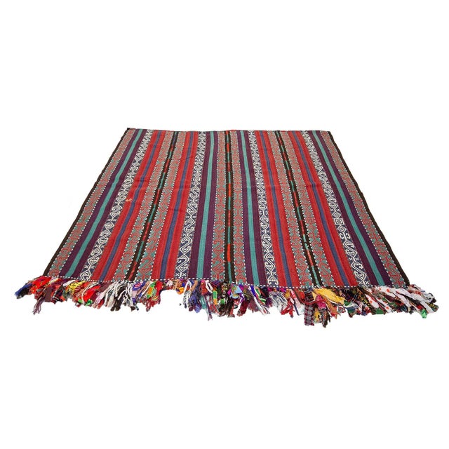 Decorative vintage kilim rug from Malatya region of Turkey. Approximately 75-85 years old. In very good condition.