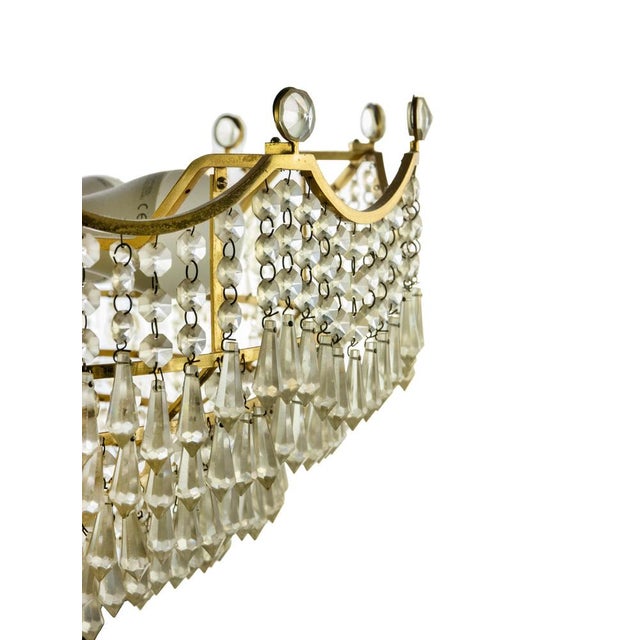 Crystal Drops Chandelier, Italy 1970s. Gilded Brass, 6 lights. Very good condition. Up to 250V (Europe/UK Standard).The...